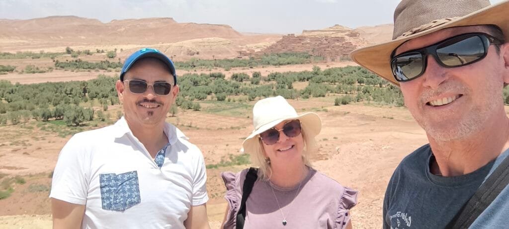 Two travelers enjoying a scenic view in southern Morocco
