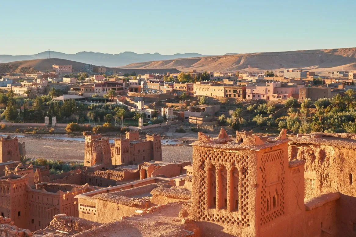 Panoramic view of Ait Ben Haddou Kasbah, a famous UNESCO site near Ouarzazate and a highlight of Morocco desert tours.