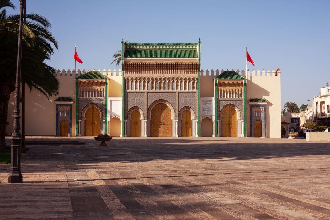 Golden gate of the Royal Palace in Fes, one of the famous architectural landmarks visited on Morocco imperial cities tours.