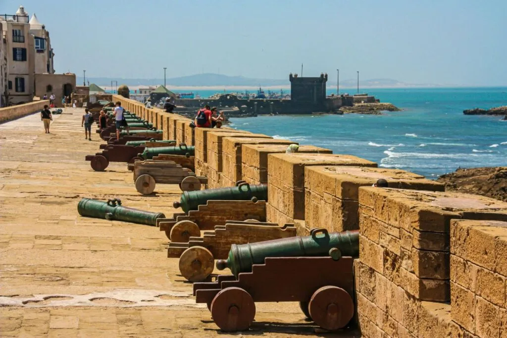 Historic cannons beside the old Portuguese ramparts near Essaouira Port.