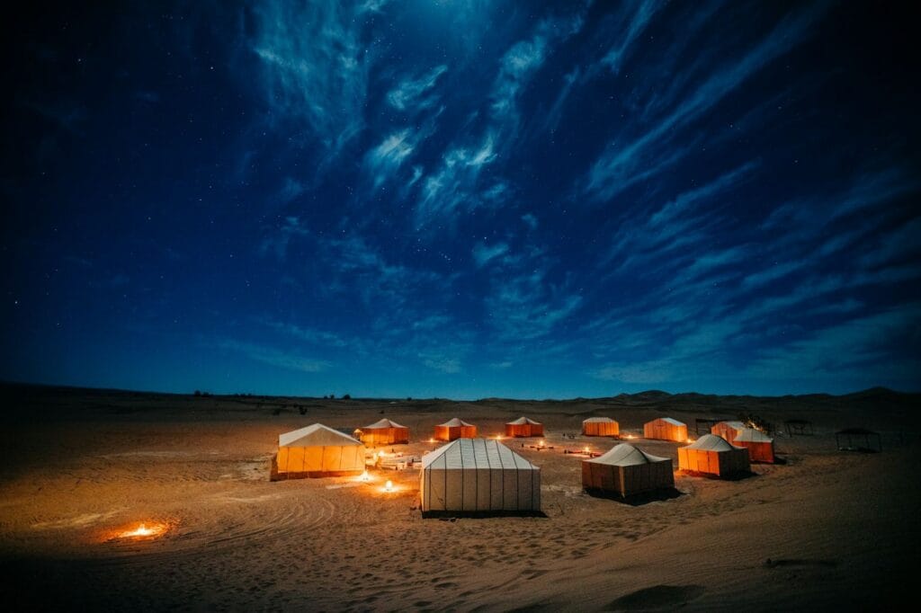 Sahara desert camp at night during a Marrakech desert tour in Morocco